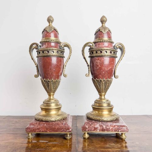 A PAIR OF FRENCH ROUGE MARBLE AND GILT BRONZE CASSOLETTES