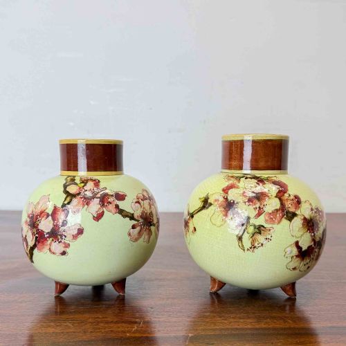 PAIR OF DOULTON LAMBETH FAIENCE CHERRY BLOSSOM VASES
