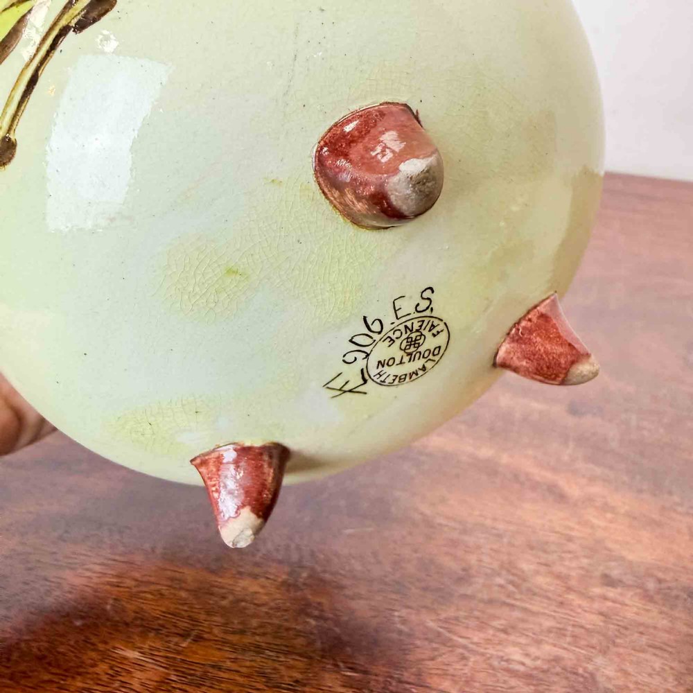 A pair of round pale green ceramic vases with hand-painted pink cherry blossom branches, dark brown collars, and small tripod feet. View VIII