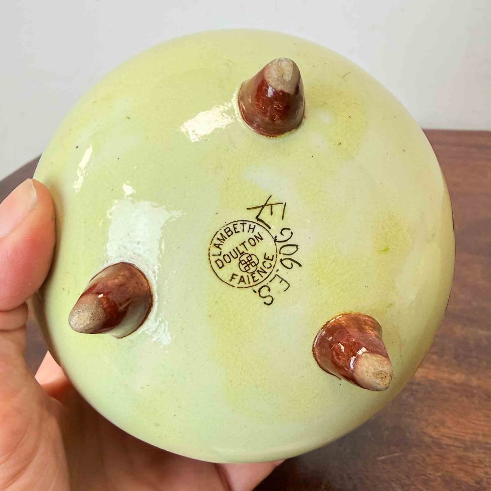 A pair of round pale green ceramic vases with hand-painted pink cherry blossom branches, dark brown collars, and small tripod feet. View IX