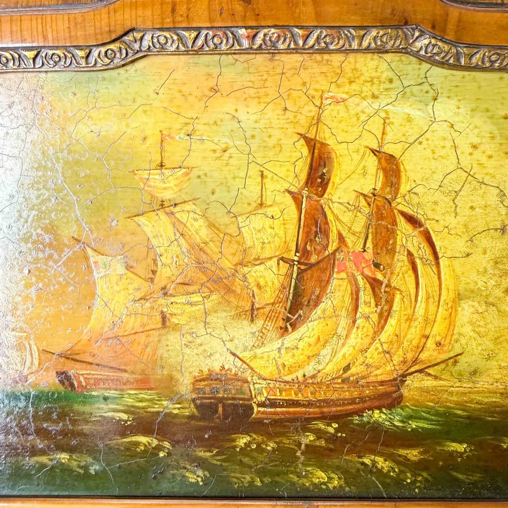 A tall Queen Anne Revival yew wood wall mirror featuring a carved shell crest at the top, an upper panel painted with a sailing ship maritime scene, and a rectangular glass mirror below. View XI