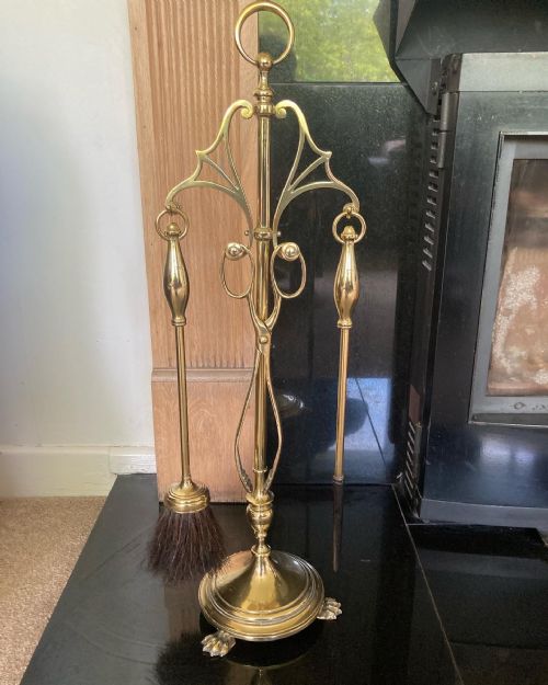 Art Nouveau brass companion stand