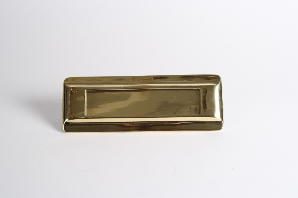 A solid polished brass Art Deco letterbox plate featuring a central rectangular flap within a streamlined bevelled frame. View VIII