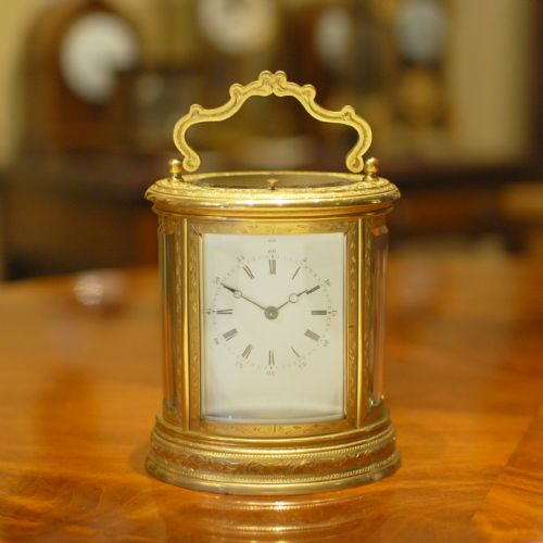oval engraved carriage clock by drocourt - CATEGORY: ANTIQUE CLOCKS - DATED 1880