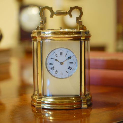 VERY UNUSUAL OVAL REPEATING CARRIAGE CLOCK - ADDITIONAL PHOTO 1