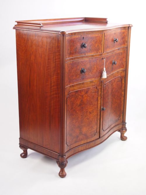 fig 1. Waring and Gillows Burr Walnut Serpentine Chest Drawers on Cupboard