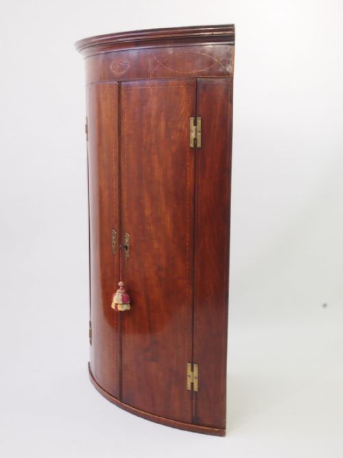fig 1. Antique Georgian Mahogany Bow Front Corner Cupboard