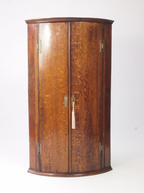 Slim Georgian Bow Fronted Oak Corner Cupboard