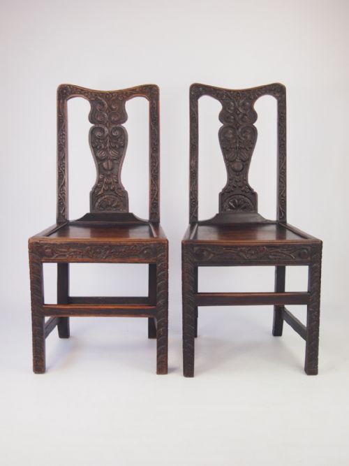 Pair Georgian and Later Carved Oak Hall Chairs