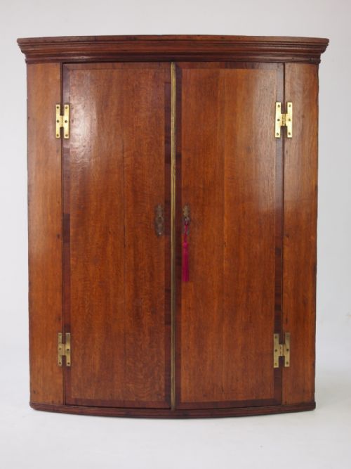 Wide Georgian Bow Fronted Oak Corner Cupboard