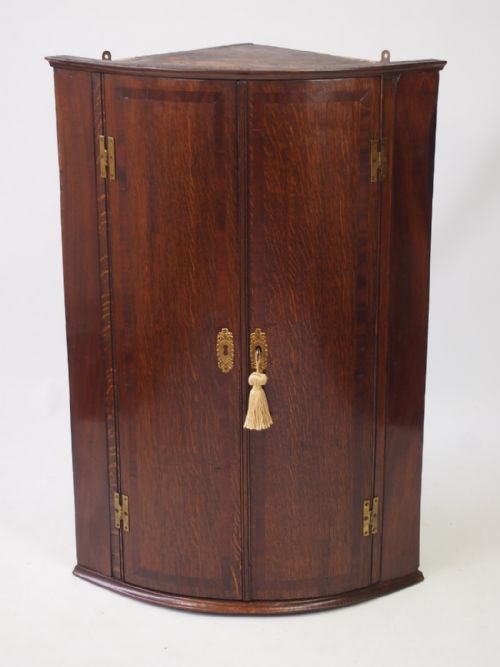 Georgian Bow Fronted Oak Corner Cupboard