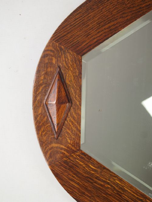 fig 1. Hexagonal Mirror in an Oval Oak Frame