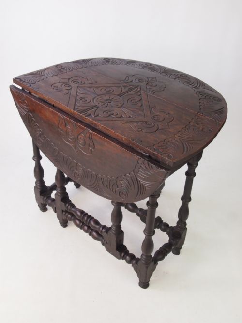 fig 1. Antique Carved Oak Gateleg Table