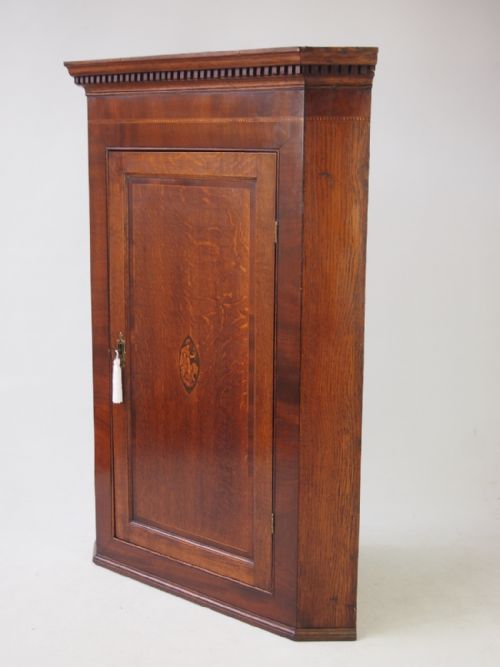 fig 2. Georgian Oak Corner Cupboard with Britannia Inlay