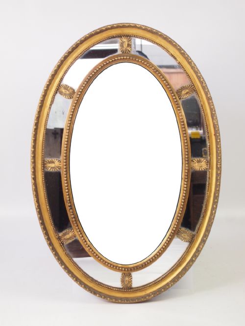 Antique Gilt Sectional Oval Wall Mirror