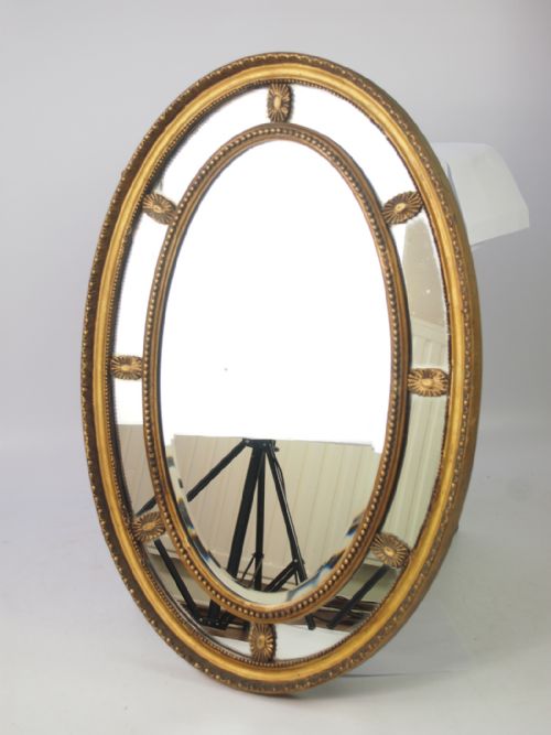 fig 1. Antique Gilt Sectional Oval Wall Mirror