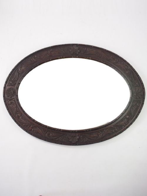 Edwardian Carved Oak Oval Wall Mirror