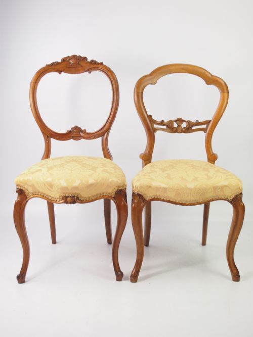Two Victorian Walnut Balloon Back Chairs
