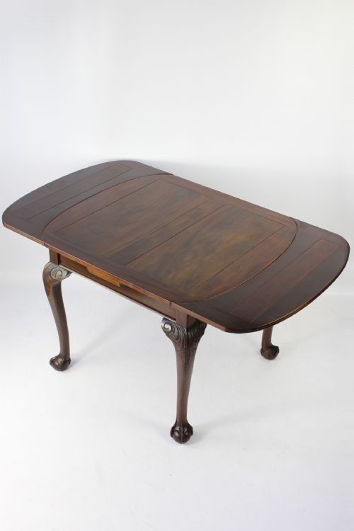 fig 1. Extending Draw Leaf Dining Table