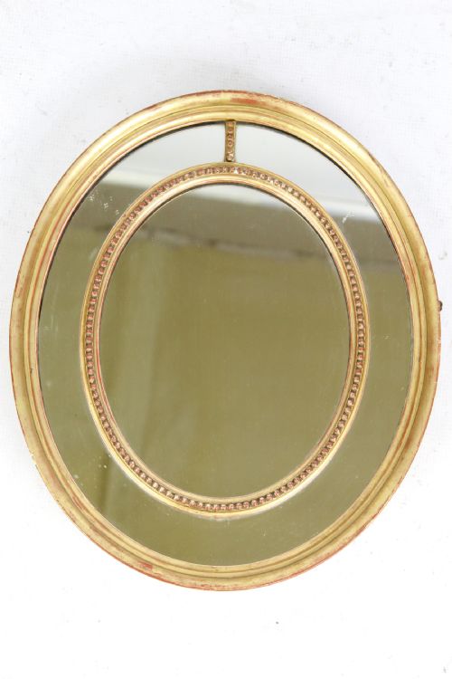 Small Victorian Gilt Sectional Oval Wall Mirror