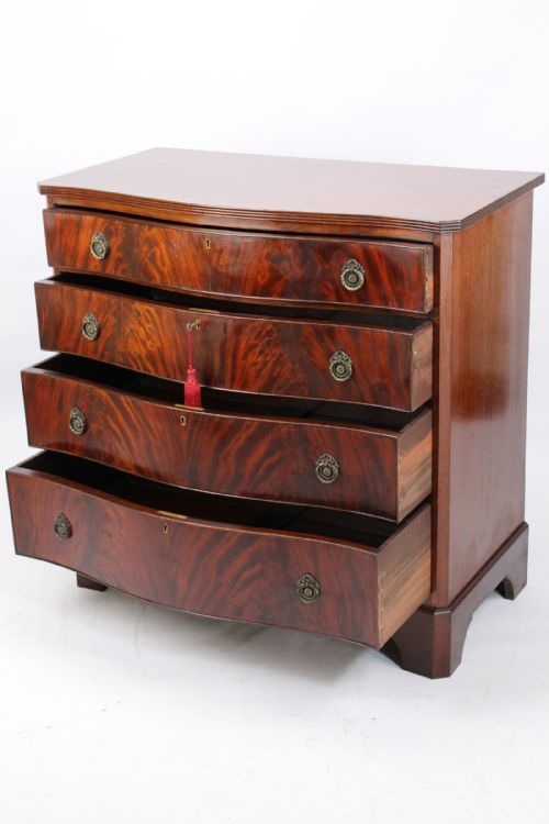 fig 1. Georgian Revival Mahogany Serpentine Chest of Drawers