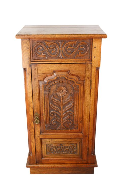 fig 1. Tall Carved Oak Pedestal Cabinet