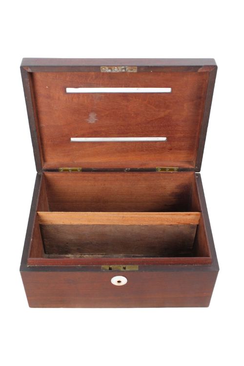 fig 1. A Victorian mahogany letter box featuring two top slots labeled Answerd and Unanswerd with brass plaques and a circular keyhole escutcheon on the front.