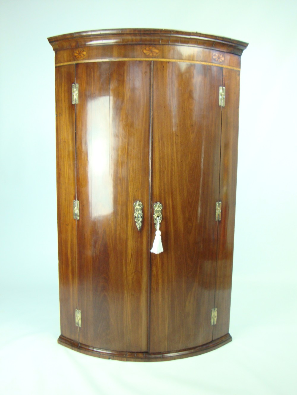Tall George III Mahogany Bow Fronted Corner Cupboard