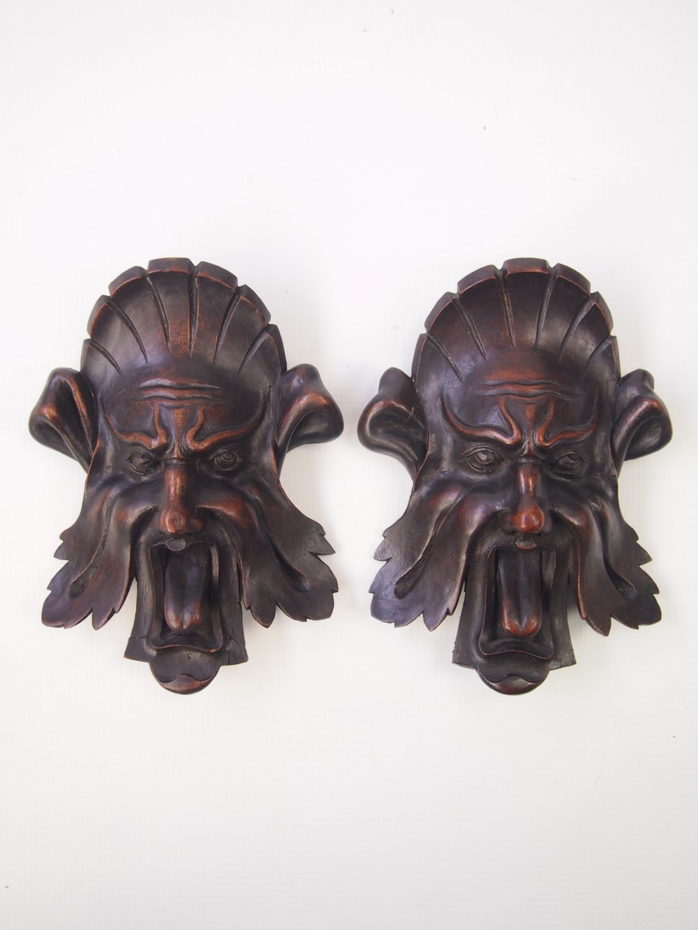 Pair of Italian Carved Hanging Wall Masks / Mascarons
