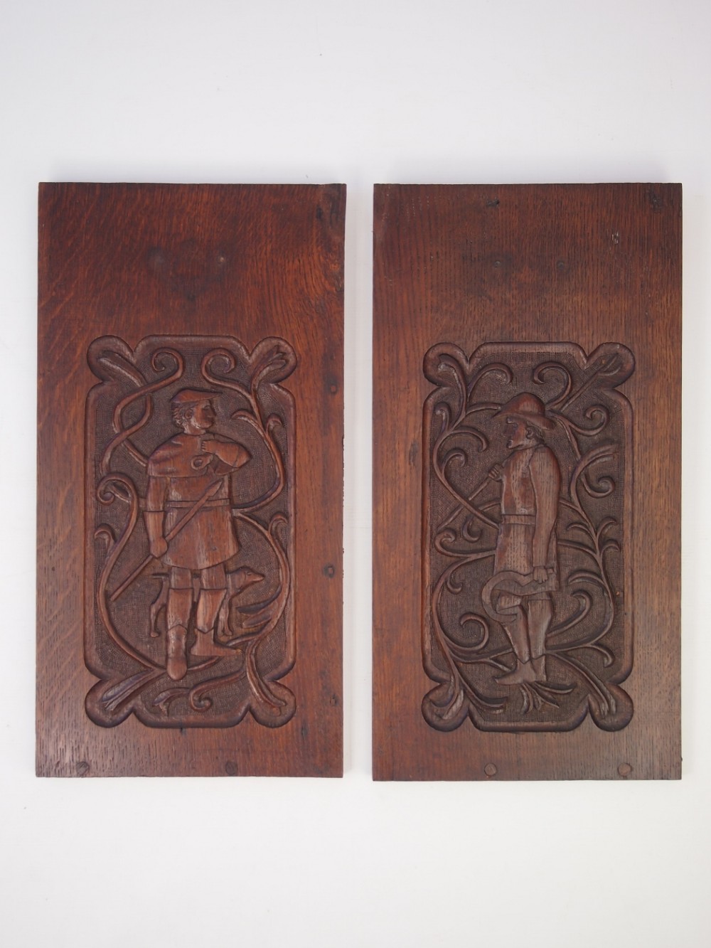 Pair Arts and Crafts Carved Oak Hanging Panels