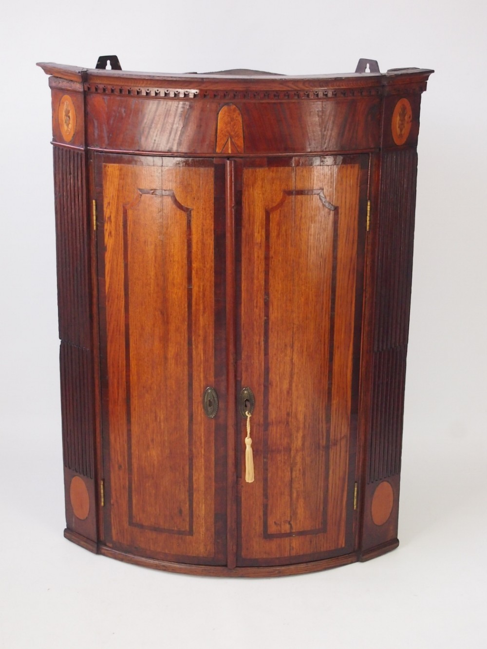 Georgian Bow Fronted Oak & Mahogany Corner Cupboard