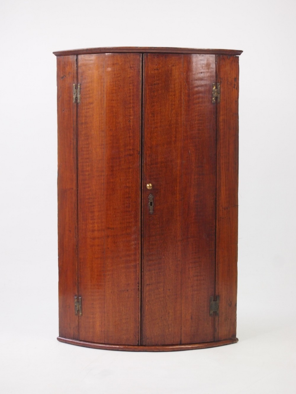 Slim Georgian Bow Fronted Oak Corner Cupboard