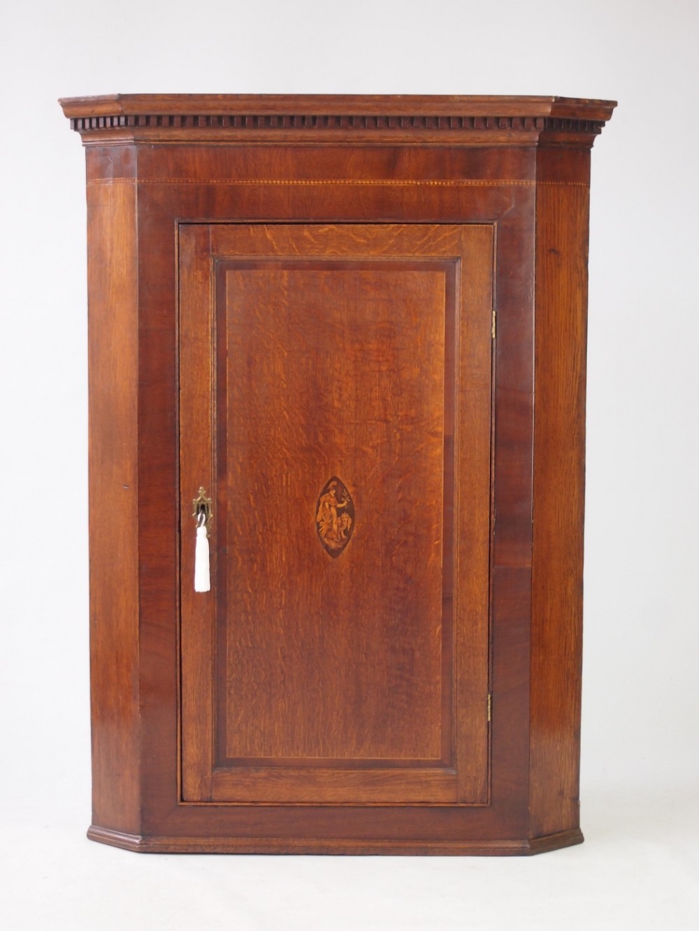 Georgian Oak Corner Cupboard with Britannia Inlay