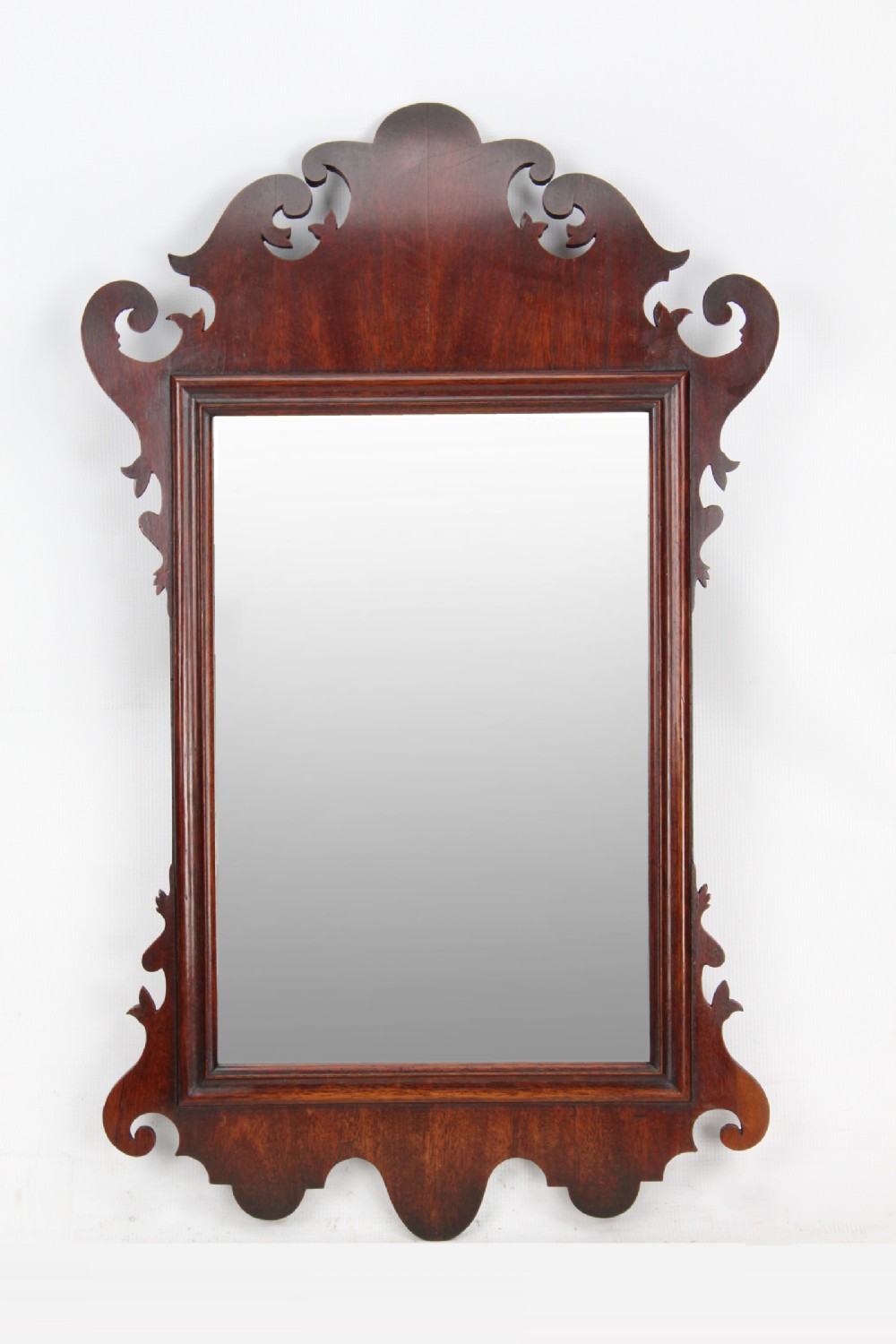 Georgian Mahogany Fretwork Mirror with Curved Pediment
