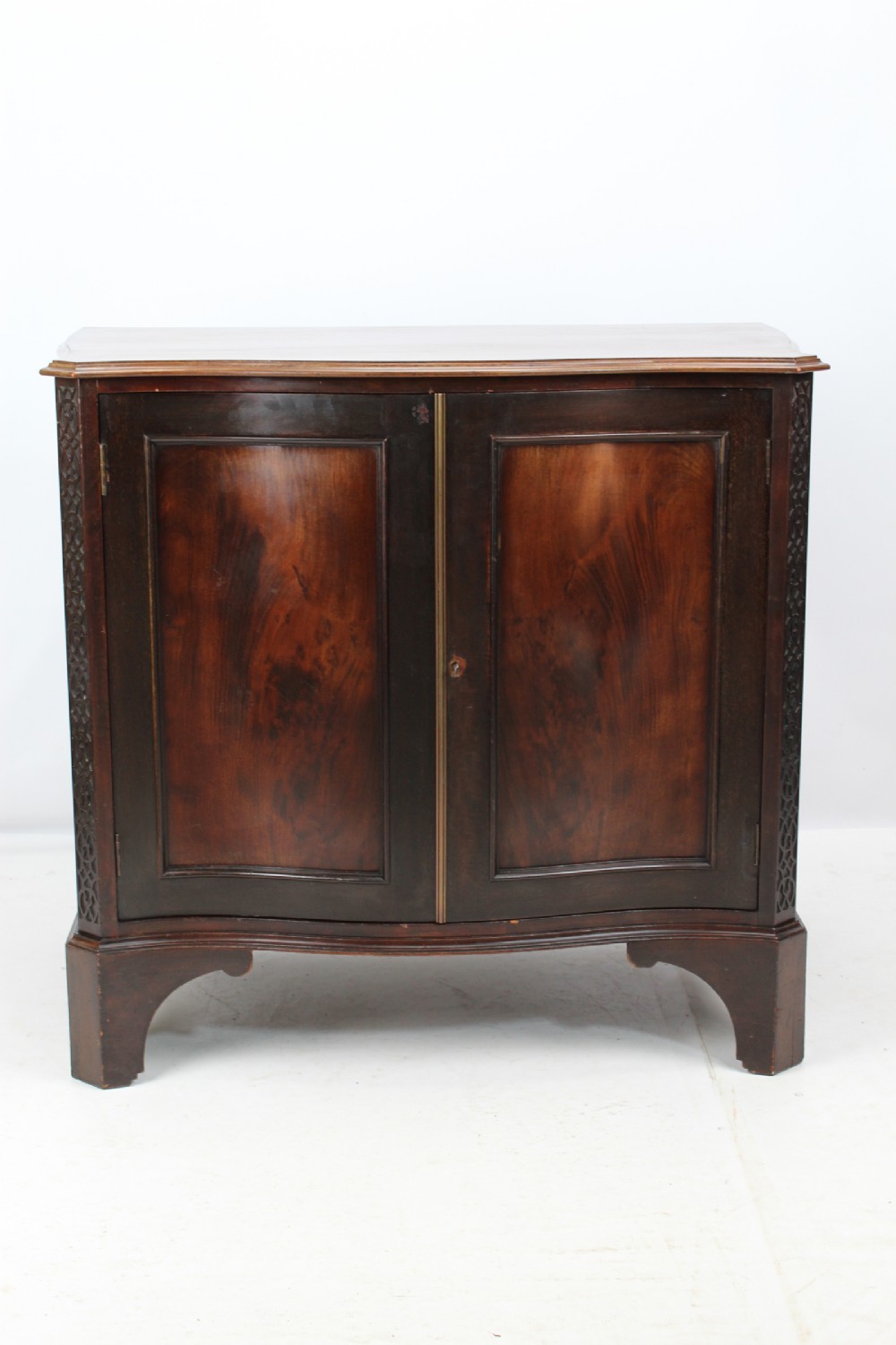 Edwardian Mahogany Serpentine Cupboard