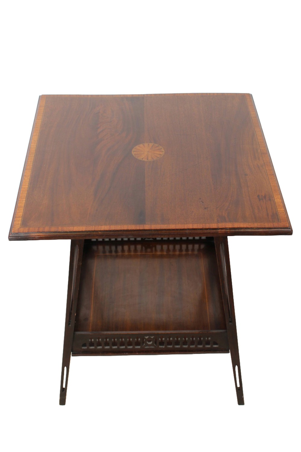 An Edwardian square mahogany side table with central satinwood marquetry inlay, crossbanded border, and a lower tier with a decorative gallery.