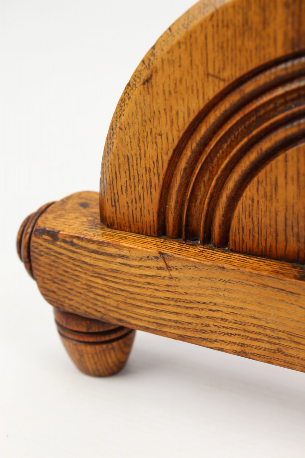 A Victorian ash freestanding towel rail featuring four horizontal bars, turned side columns with finials, and carved pedestal feet. View VII