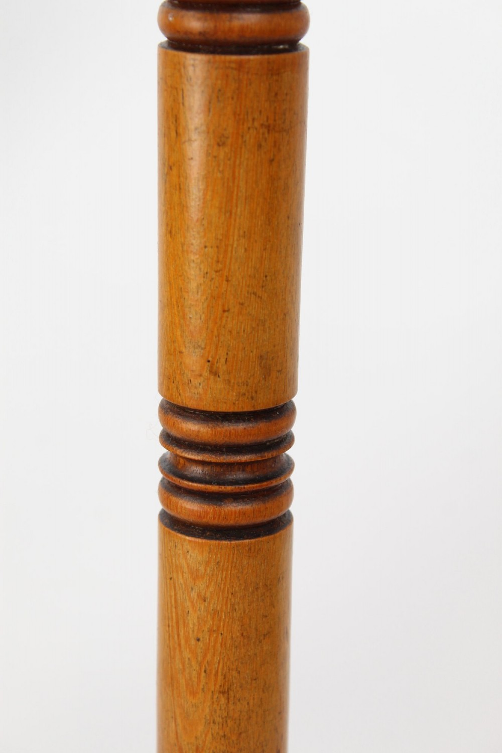 A Victorian ash freestanding towel rail featuring four horizontal bars, turned side columns with finials, and carved pedestal feet. View IX