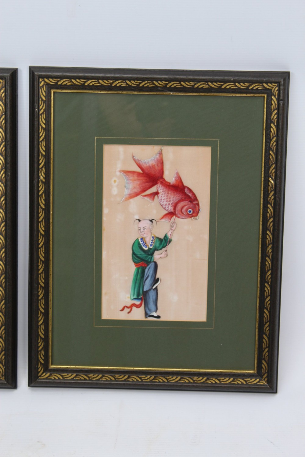 A pair of small framed antique Chinese watercolour paintings on pith paper, set in dark green mounts with gilded decorative frames. View III