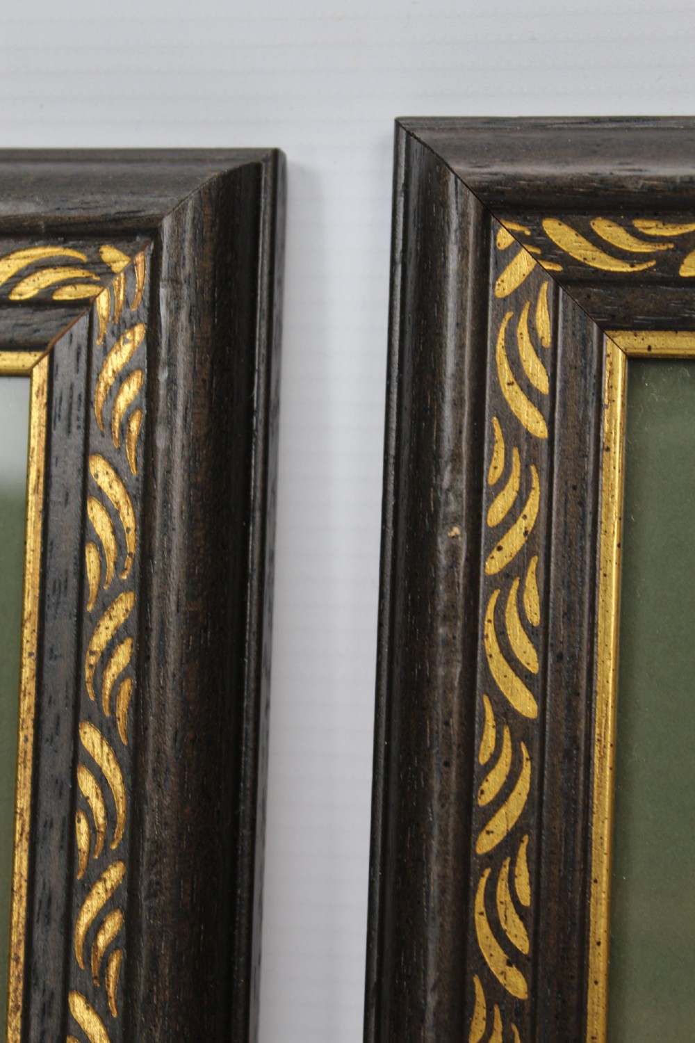 A pair of small framed antique Chinese watercolour paintings on pith paper, set in dark green mounts with gilded decorative frames. View X