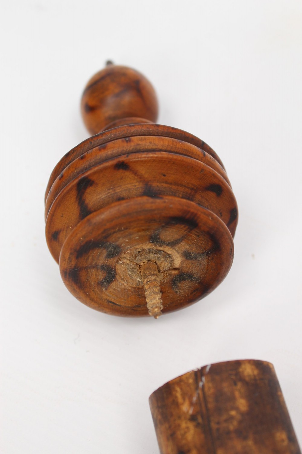 A long natural bamboo curtain pole featuring turned wooden finials at both ends and a set of matching wooden curtain rings stacked near one end. View XIII