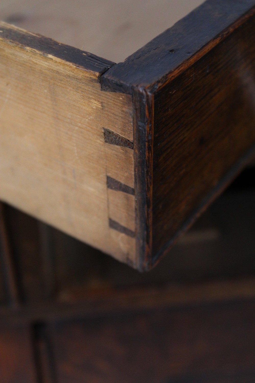 A low Georgian oak cupboard featuring two frieze drawers with turned wooden knobs above a pair of panelled cupboard doors. View VIII
