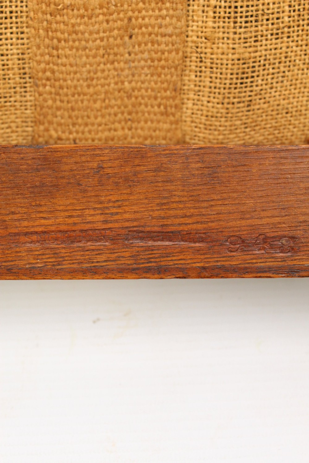 A square Victorian oak dressing stool featuring fluted turned legs with gilt accents and a cream fabric seat decorated with green leaf motifs. View XIII