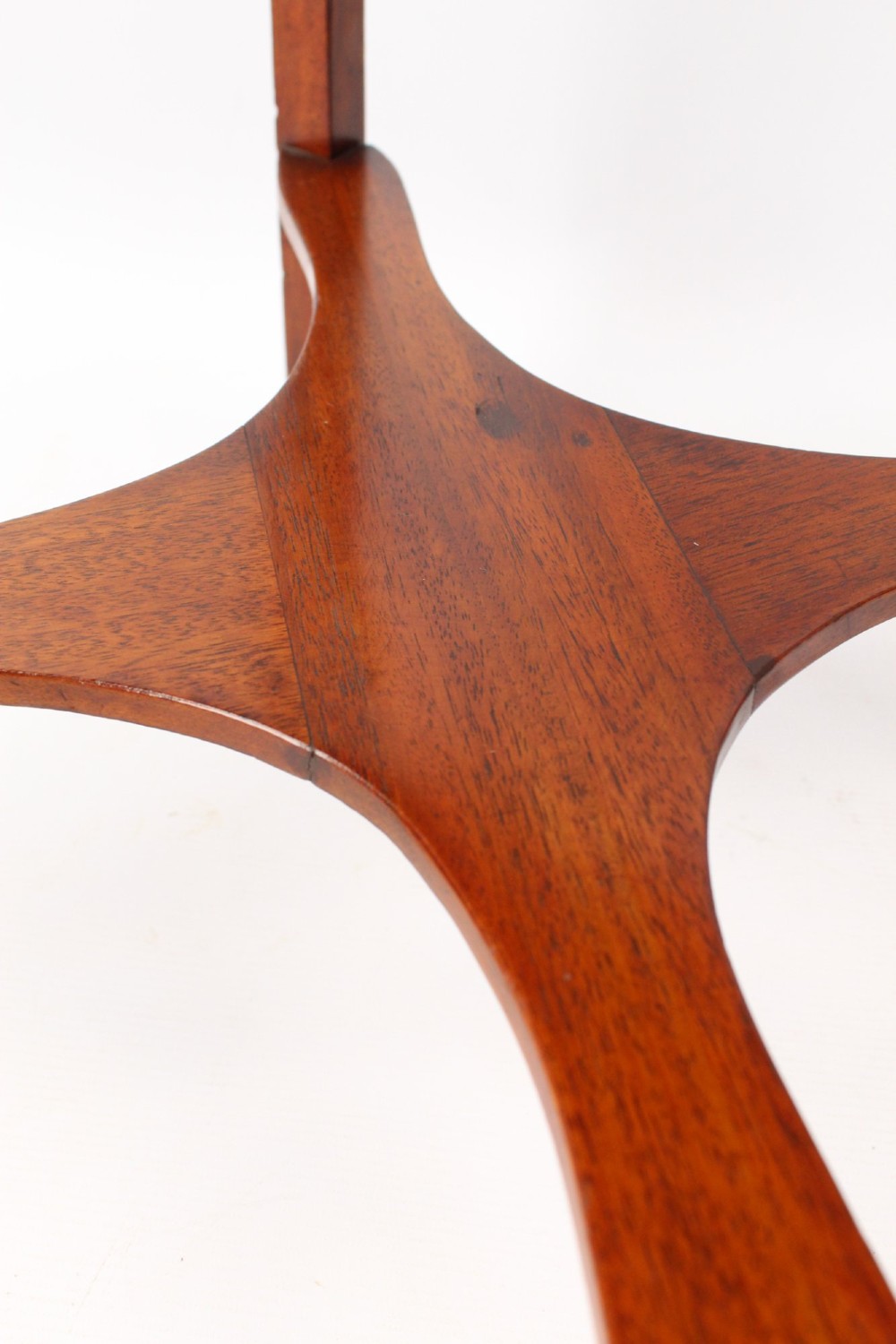A two-tier Georgian mahogany bedside table with a single drawer, square top, and curved X-form stretcher. View IX