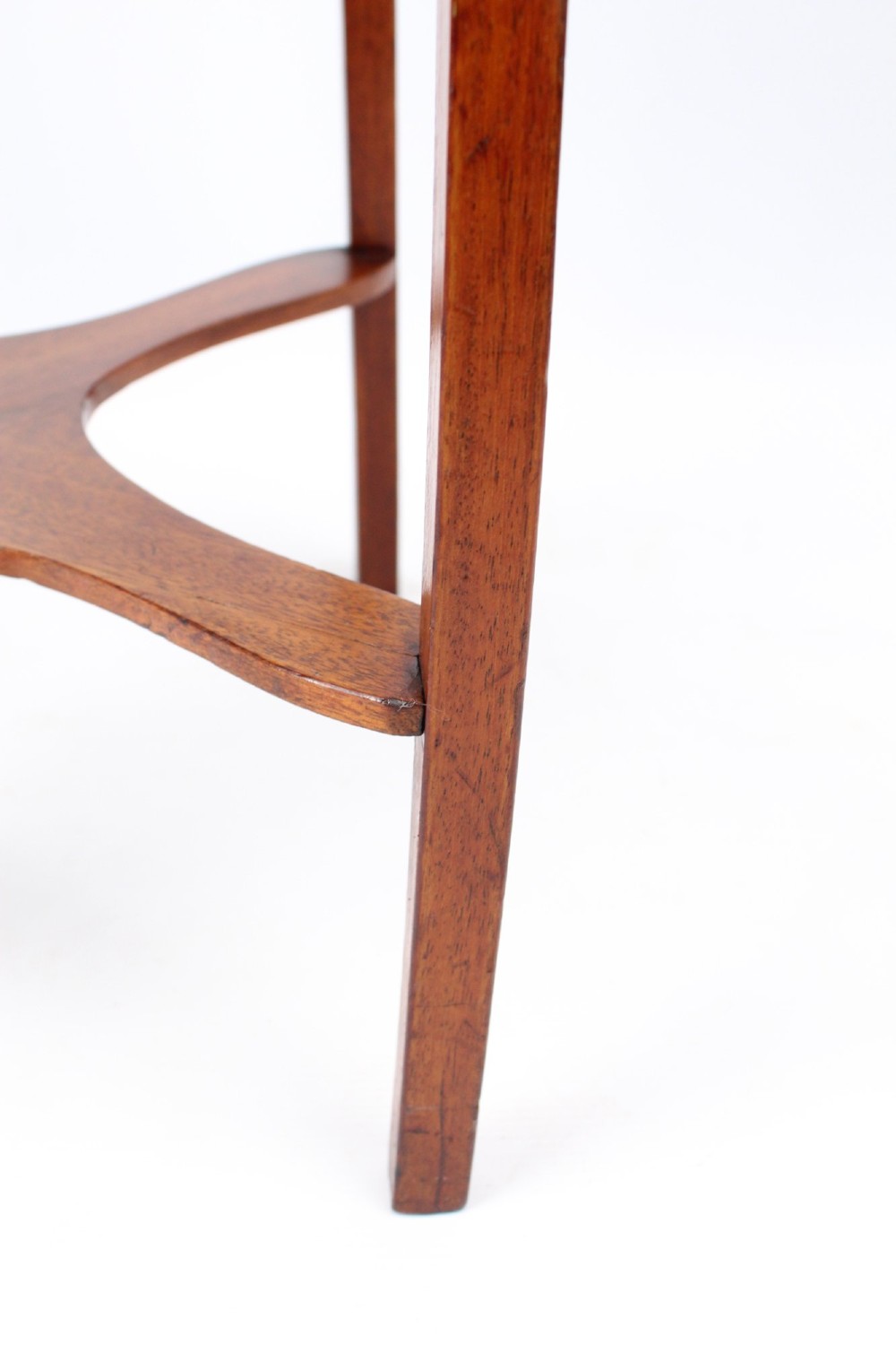 A two-tier Georgian mahogany bedside table with a single drawer, square top, and curved X-form stretcher. View XI