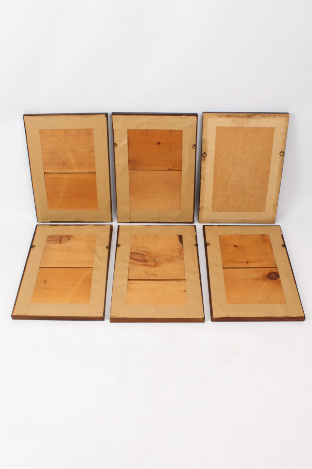 A set of six framed antique Vanity Fair lithographs featuring caricatures of judges and barristers in legal robes and wigs, presented in dark wood frames with gilt slips. View V