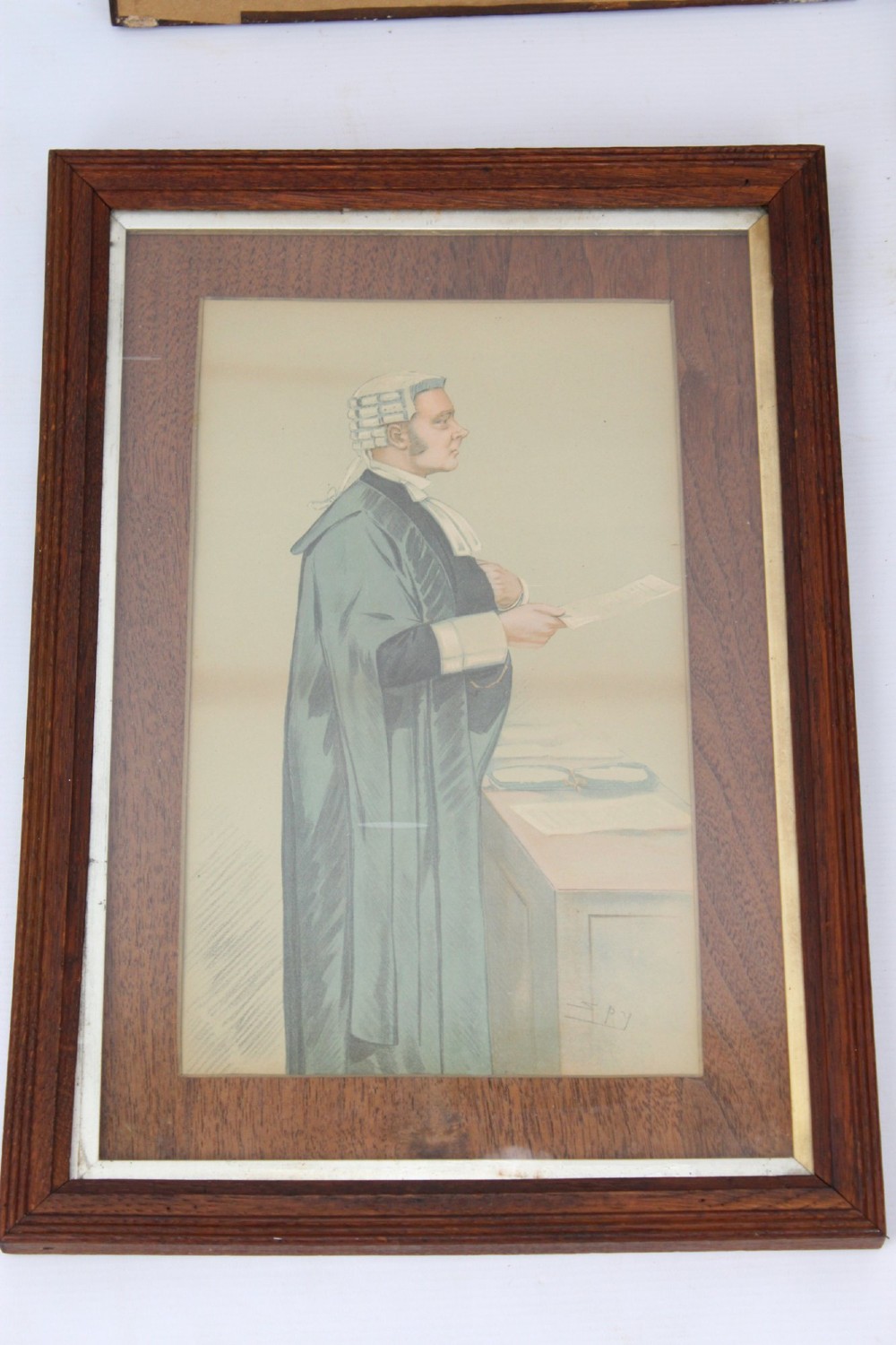 A set of six framed antique Vanity Fair lithographs featuring caricatures of judges and barristers in legal robes and wigs, presented in dark wood frames with gilt slips. View VI