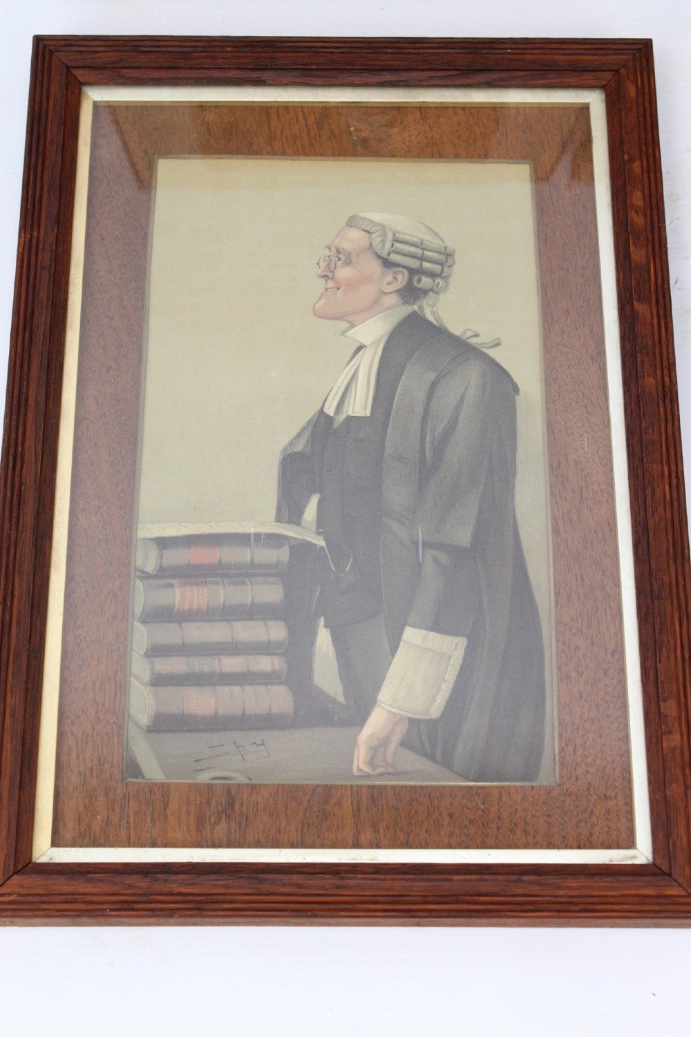A set of six framed antique Vanity Fair lithographs featuring caricatures of judges and barristers in legal robes and wigs, presented in dark wood frames with gilt slips. View VII