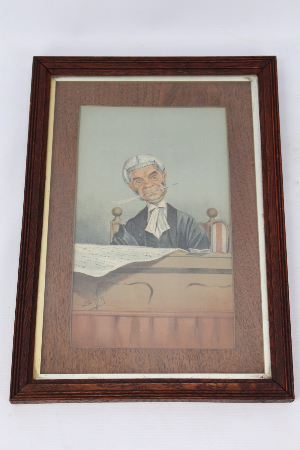 A set of six framed antique Vanity Fair lithographs featuring caricatures of judges and barristers in legal robes and wigs, presented in dark wood frames with gilt slips. View X