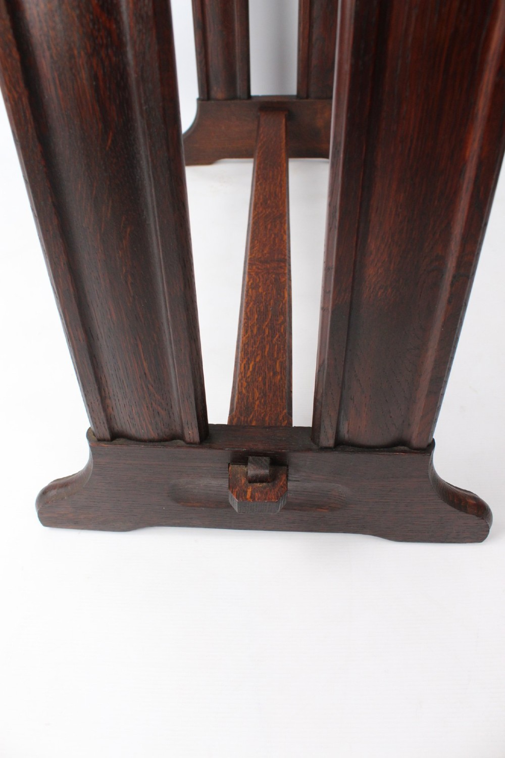 An Edwardian Arts and Crafts medium brown oak side table featuring double upright supports, exposed joint details, and a low stretcher. View VII